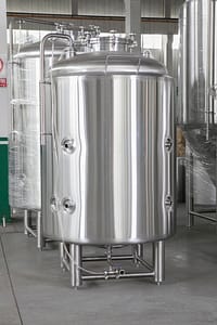 New 1500 Liter bright tank (serving tank) crafted from high-grade stainless steel, designed for the storage and serving of finished beer in medium-scale craft breweries. Features specialized valves and fittings for carbonation and dispensing – craft brewery and brewing equipment