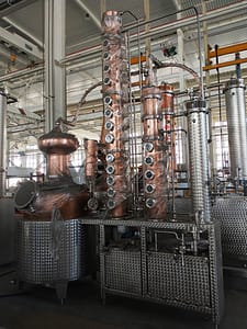 New 500 Liter still with 2 columns, 16 plates, gin basket for small-batch craft distillation and production processes in the beverage or chemical industry. The still features various components such as the boiler, columns, condenser - Distillery Equipment Brisbane