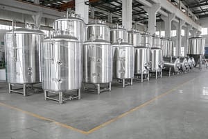 New 1500 Liter and 3000 Liter bright tanks (serving tanks) crafted from high-grade stainless steel, designed for the storage and serving of finished beer in medium-scale craft breweries. Features specialized valves and fittings for carbonation and dispensing – craft brewery and brewing equipment